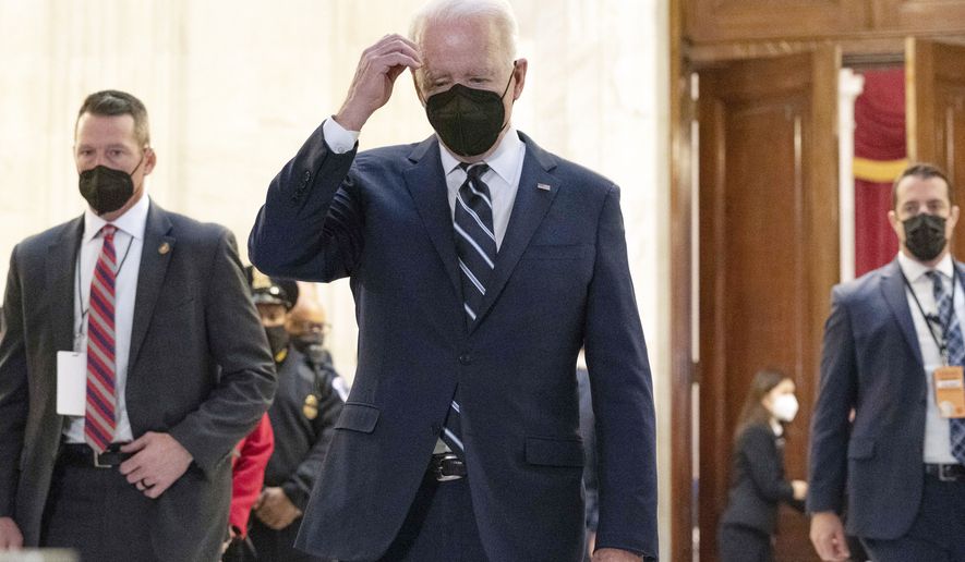 President Joe Biden walks to speak to the media after meeting privately with Senate Democrats, Thursday, Jan. 13, 2022, on Capitol Hill in Washington. (AP Photo/Jose Luis Magana)