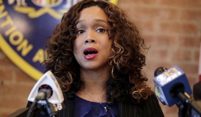 Maryland State Attorney Marilyn Mosby speaks during a news conference announcing the indictment of correctional officers, on Dec. 3, 2019, in Baltimore. Ms. Mosby pleaded not guilty on Feb. 4, 2022, to federal charges of allegedly lying about experiencing pandemic-related hardship on an application to withdraw $90,000 in retirement funds. (AP Photo/Julio Cortez, File)  **FILE**