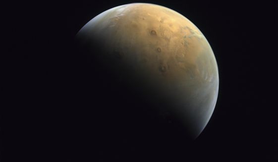 This Feb. 10, 2021, file image taken by the United Arab Emirates&#39; &amp;quot;Amal,&amp;quot; or &amp;quot;Hope,&amp;quot; probe released Sunday, Feb. 14, 2021, shows Mars. Scientists say they&#39;ve confirmed the meteorite from Mars contains no evidence of ancient Martian life. The rock caused a splash 25 years ago when a NASA-led team announced that its organic compounds may have been left by living creatures, however primitive. Researchers chipped away at that theory over the decades. A team of scientists led by Andrew Steele of the Carnegie Institution published their findings Thursday, Jan. 13, 2022. (Mohammed bin Rashid Space Center/UAE Space Agency, via AP) ** FILE **