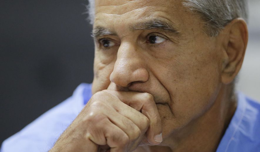 Sirhan Sirhan reacts during a parole hearing on Feb. 10, 2016, at the Richard J. Donovan Correctional Facility in San Diego. California Gov. Gavin Newsom on Thursday, Jan. 13, 2022, rejected releasing Robert F. Kennedy assassin Sirhan Sirhan from prison more than a half-century after the 1968 slaying left a deep wound during one of America’s darkest times. (AP Photo/Gregory Bull, Pool, File)  **FILE**