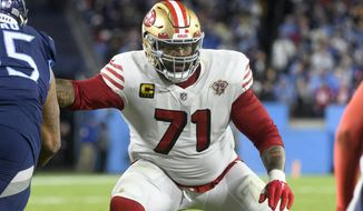 San Francisco 49ers offensive tackle Trent Williams (71) plays against the Tennessee Titans during an NFL football game, on Dec. 23, 2021, in Nashville, Tenn. Willams was named to The Associated Press 2021 NFL All-Pro Team, announced Friday, Jan. 14, 2022. (AP Photo/John Amis) **FILE**