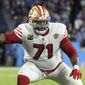 San Francisco 49ers offensive tackle Trent Williams (71) plays against the Tennessee Titans during an NFL football game, on Dec. 23, 2021, in Nashville, Tenn. Willams was named to The Associated Press 2021 NFL All-Pro Team, announced Friday, Jan. 14, 2022. (AP Photo/John Amis) **FILE**