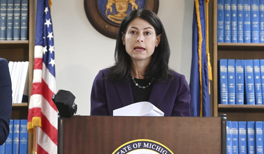 Attorney General Dana Nessel announces charges for several security guards from Northland Mall in the 2014 death of McKenzie Cochran during a news conference in Detroit on Thursday, Oct. 14, 2021.  Nessel is asking federal prosecutors, Thursday, Jan. 13, 2022,  to open a criminal investigation into 16 Republicans who submitted false certificates stating they were the state’s presidential electors despite Joe Biden’s 154,000-vote victory in 2020. (Max Ortiz/Detroit News via AP)