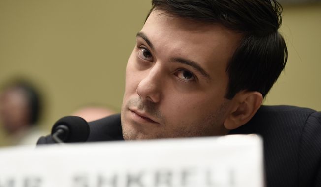 Former Turing Pharmaceuticals CEO Martin Shkreli attends the House Committee on Oversight and Reform Committee hearing on Capitol Hill in Washington, Feb. 4, 2016. A federal judge on Friday, Jan. 14, 2022 ordered Shkreli to return $64.6 million in profits he and his company reaped from inflating the price of the life-saving drug Daraprim and barred him from participating in the pharmaceutical industry for the rest of his life. (AP Photo/Susan Walsh, File)