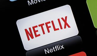 This June 24, 2015, file photo, shows the Netflix Apple TV app icon  in South Orange, N.J. Netflix is raising prices for its video streaming customers in the U.S. and Canada, less than a year and a half since its last price increase, as competition from other streaming services increases.  (AP Photo/Dan Goodman, File)  **FILE**