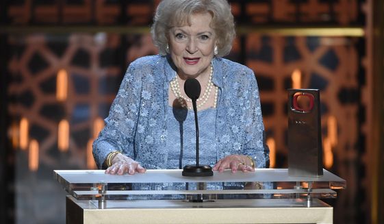Betty White accepts the legend award at the TV Land Awards at the Saban Theatre April 11, 2015, in Beverly Hills, Calif. The late Betty White was a tireless advocate for animals for her entire life, from caring for homeless animals as a child to launching her own weekly TV show “The Pet Set” dedicated to her celebrity friends and their pets. Her biggest contribution, though, may be yet to come, as fans get set to donate to animal welfare charities and local shelters on Jan. 17, 2022, as part of the #BettyWhiteChallenge. (Photo by Chris Pizzello/Invision/AP, File)