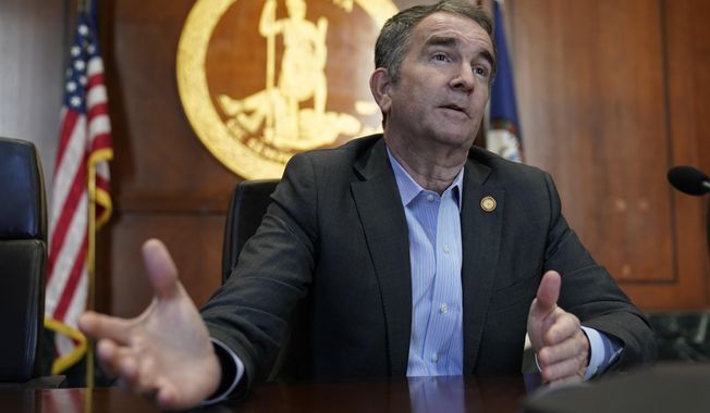 Virginia Gov. Ralph Northam speaks during an interview in his conference room at the Capitol Monday, Jan. 10, 2022, in Richmond, Va. Northam, who&#x27;s term ends Saturday, Jan. 15,  will go back to private practice. (AP Photo/Steve Helber)
