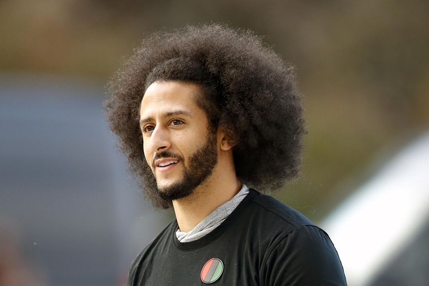 In this Nov. 16, 2019, file photo, free agent quarterback Colin Kaepernick arrives for a workout for NFL football scouts and media in Riverdale, Ga. While sports have always been indivisible from politics and public conflicts, there has been a major ground shift in the years since Michael Jordan made public neutrality on all non-sports issues an essential part of his brand. Now, there is almost an expectation of advocacy, especially with the precedent set by Colin Kaepernick&#39;s protests and the embrace by many of the Black Lives Matter cause. (AP Photo/Todd Kirkland, File)