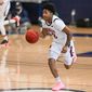 Howard Bison guard Elijah Hawkins (3) dribbles the ball up the court during basketball game against the Notre Dame Fighting Irish at Burr Gymnasium on January 17th 2022 in Washington DC.