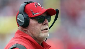 Tampa Bay Buccaneers head coach Bruce Arians watches play against the Philadelphia Eagles during the second half of an NFL wild-card football game Sunday, Jan. 16, 2022, in Tampa, Fla. (AP Photo/Mark LoMoglio) **FILE**