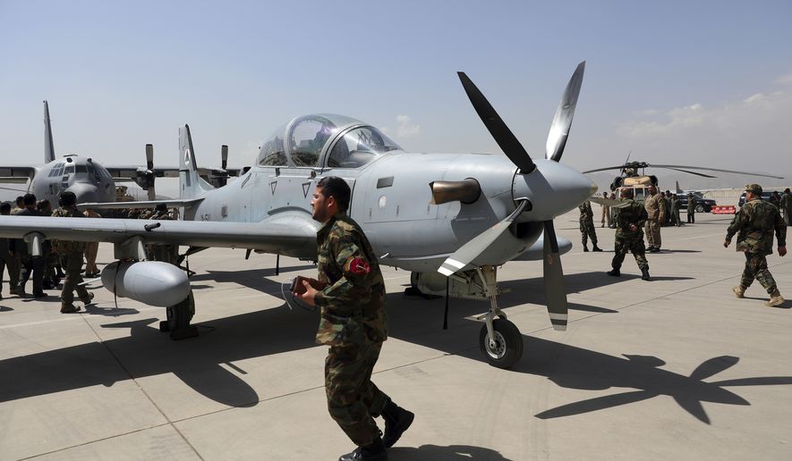 A-29 Super Tucano planes are on display during a handover from the NATO-led Resolute Support mission to the Afghan army at the military Airport in Kabul, Afghanistan, Sept. 17, 2020. A year-old report by Washingtons Afghanistan watchdog warned in early 2021, months before President Joe Biden announced the end to America&#39;s longest war, the Afghan air force would collapse without critical U.S. aid, training and American maintenance. The report by the Special Inspector General for Afghanistan Reconstruction John Sopko was classified back when it was written and only declassified on Tuesday, Jan. 18, 2021. (AP Photo/Rahmat Gul, File)