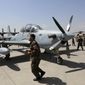 A-29 Super Tucano planes are on display during a handover from the NATO-led Resolute Support mission to the Afghan army at the military Airport in Kabul, Afghanistan, Sept. 17, 2020. A year-old report by Washingtons Afghanistan watchdog warned in early 2021, months before President Joe Biden announced the end to America&#39;s longest war, the Afghan air force would collapse without critical U.S. aid, training and American maintenance. The report by the Special Inspector General for Afghanistan Reconstruction John Sopko was classified back when it was written and only declassified on Tuesday, Jan. 18, 2021. (AP Photo/Rahmat Gul, File)