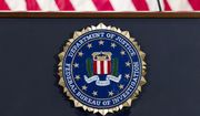This June 14, 2018, file photo shows an FBI seal on a podium before a news conference at the agency&#39;s headquarters in Washington. The FBI and other federal government agencies are increasingly looking to counter cyberthreats through tools other than criminal indictments. That&#39;s according to the bureau’s top cyber official. (AP Photo/Jose Luis Magana, File)
