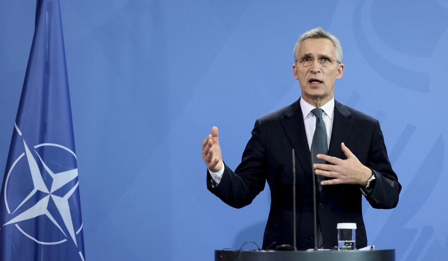 NATO Secretary-General Jens Stoltenberg speaks during a news conference with German Chancellor Olaf Scholz after their talks at the Chancellery in Berlin, Germany, Jan. 18, 2022. (Hannibal Hanschke/Pool via AP) ** FILE **