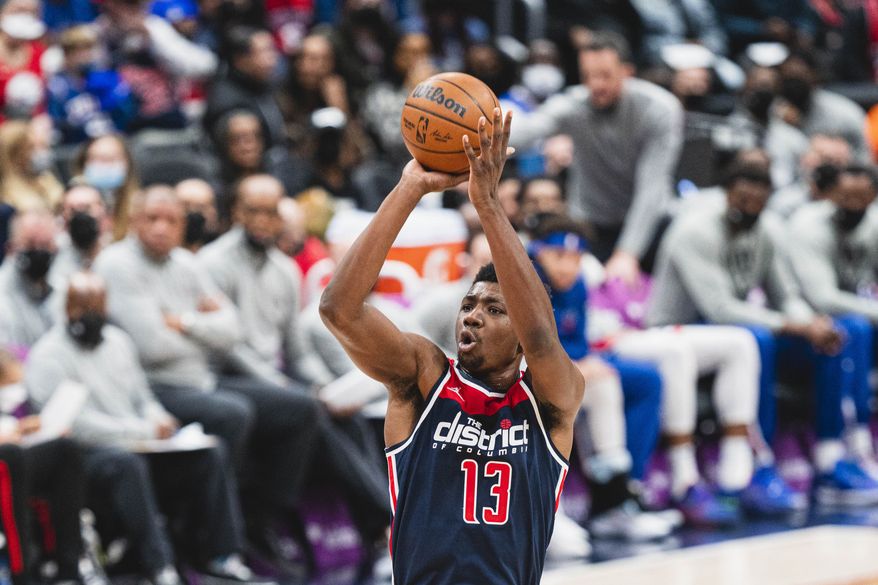 Washington Wizards Thomas Bryant with a jump shot against the Philadelphia 76ers at Capital One Arena in Washington D.C., Jan. 17, 2022. (Photo by All-Pro Reels)