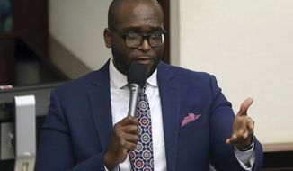 State Rep. Shevrin Jones, D-West Park, asks a question concerning the medical marijuana bill during session Wednesday, March, 13 2019, in Tallahassee, Fla. A bill pushed by Republican Florida Gov. Ron DeSantis that would prohibit public schools and private businesses from making white people feel “discomfort” when they teach students or train employees about discrimination in the nation&#39;s past received its first approval Tuesday, Dec. 18, 2022. “This bill&#39;s not for Blacks, this bill was not for any other race. This was directed to make whites not feel bad about what happened years ago,” said Jones. (AP Photo/Steve Cannon, File)