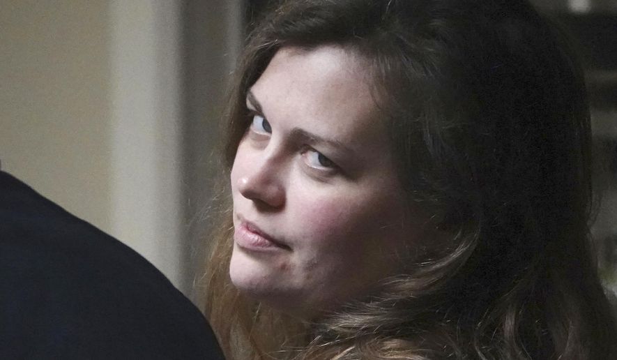 Hannah Roemhild, who is accused of driving through checkpoints outside President Donald Trump&#39;s Florida home Mar-a-Lago, looks back during her initial appearance hearing, Monday, Feb. 3, 2020, West Palm Beach, Fla.  Roemhild has been found not guilty by reason of insanity. Florida prosecutors agreed Tuesday, Jan. 18, 2022 to accept Hannah Roemhild’s plea during a brief hearing with the 32-year-old singer appearing by Zoom from her home state, Connecticut.(Joe Cavaretta/South Florida Sun-Sentinel via AP, File)