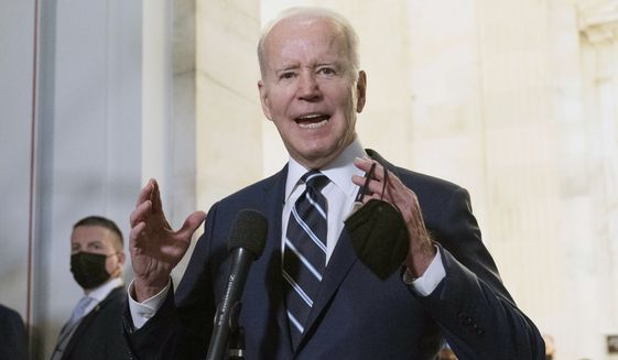President Joe Biden speaks to the media after meeting privately with Senate Democrats, Thursday, Jan. 13, 2022, on Capitol Hill in Washington. (AP Photo/Jose Luis Magana)