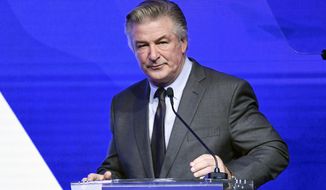 Alec Baldwin performs emcee duties at the Robert F. Kennedy Human Rights Ripple of Hope Award Gala at New York Hilton Midtown on Dec. 9, 2021, in New York. The widow and two sisters of a U.S. Marine killed in Afghanistan are suing Baldwin, alleging he exposed them to a flood of social media hatred and insults by claiming on Instagram that one sister was an &amp;quot;insurrectionist&amp;quot; for participating in the Jan. 6, 2021, demonstration in support of former President Donald Trump in Washington, D.C. The sister protested peacefully and legally and was not among those who stormed the U.S. Capitol that day, according to the lawsuit filed Monday, Jan. 17, 2022 in U.S. District Court in Cheyenne. (Photo by Evan Agostini/Invision/AP, File)