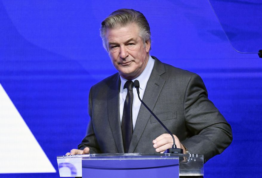Alec Baldwin performs emcee duties at the Robert F. Kennedy Human Rights Ripple of Hope Award Gala at New York Hilton Midtown on Dec. 9, 2021, in New York. The widow and two sisters of a U.S. Marine killed in Afghanistan are suing Baldwin, alleging he exposed them to a flood of social media hatred and insults by claiming on Instagram that one sister was an &amp;quot;insurrectionist&amp;quot; for participating in the Jan. 6, 2021, demonstration in support of former President Donald Trump in Washington, D.C. The sister protested peacefully and legally and was not among those who stormed the U.S. Capitol that day, according to the lawsuit filed Monday, Jan. 17, 2022 in U.S. District Court in Cheyenne. (Photo by Evan Agostini/Invision/AP, File)