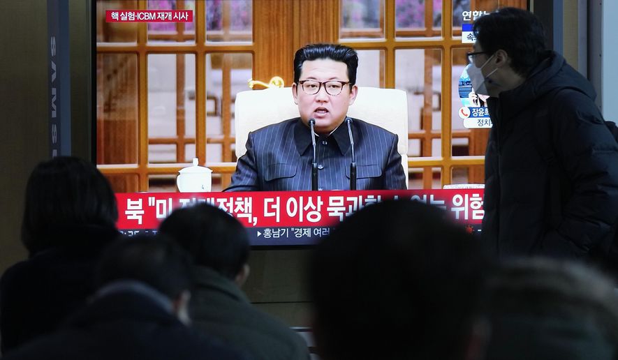People watch a TV showing a file image of North Korean leader Kim Jong Un shown during a news program at the Seoul Railway Station in Seoul, South Korea, Thursday, Jan. 20, 2022. Accusing the United States of hostility and threats, North Korea on Thursday said it will consider restarting &amp;quot;all temporally-suspended activities&amp;quot; it had paused during its diplomacy with the Trump administration, in an apparent threat to resume testing of nuclear explosives and long-range missiles. (AP Photo/Ahn Young-joon)