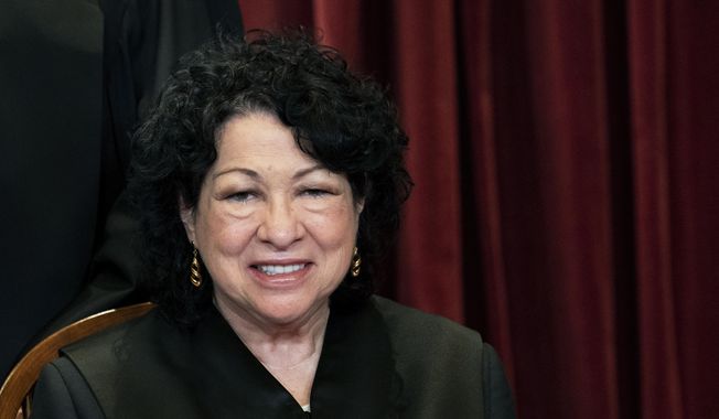 In this April 23, 2021, file photo, Associate Justice Sonia Sotomayor sits during a group photo at the Supreme Court in Washington. (Erin Schaff/The New York Times via AP, Pool, File)