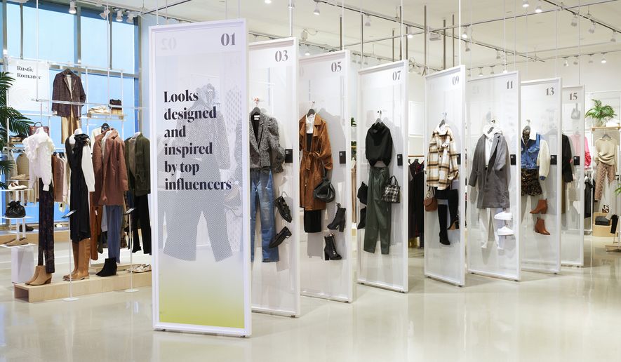This image provided by Amazon, shows how clothing could be displayed at the company&#39;s new Amazon Style store concept. Amazon is set to open its first-ever physical clothing store later this year at the Americana at Brand mall in Glendale, Calif., that will push out personalized recommendations as customers shop and scan items on their phone and feature high-tech dressing rooms, the company announced Thursday, Jan. 20, 2021. (Greg Montijo/Amazon via AP)