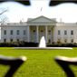 The White House exterior, as seen through a perimeter fence. (AP Photo)