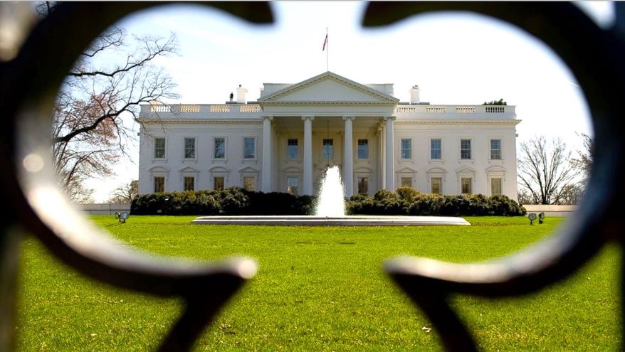 The White House exterior, as seen through a perimeter fence. (AP Photo)