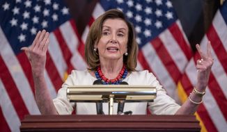 Speaker of the House Nancy Pelosi of Calif., speaks during her weekly press conference, Thursday, Jan. 20, 2022 at the Capitol in Washington. (Shawn Thew/Pool via AP)