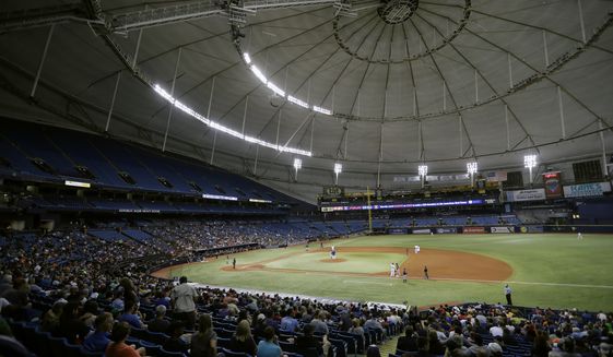 The Houston Astros play the Texas Rangers during the third inning of a baseball game at Tropicana Field in St. Petersburg, Fla., Aug. 29, 2017.  The Tampa Bay Rays’ proposed plan to split the season between Florida and Montreal has been rejected by Major League Baseball. Rays principal owner Stuart Sternberg announced the news on Thursday, Jan. 20, 2022. (AP Photo/Chris O&#39;Meara, File) **FILE**