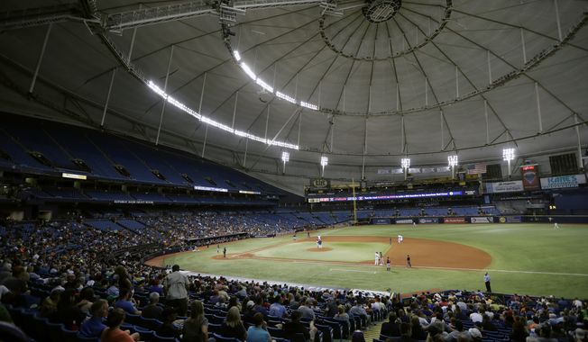The Houston Astros play the Texas Rangers during the third inning of a baseball game at Tropicana Field in St. Petersburg, Fla., Aug. 29, 2017.  The Tampa Bay Rays’ proposed plan to split the season between Florida and Montreal has been rejected by Major League Baseball. Rays principal owner Stuart Sternberg announced the news on Thursday, Jan. 20, 2022. (AP Photo/Chris O&#x27;Meara, File) **FILE**