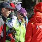 Mikaela Shiffrin, center, talks with her ski technician, right, along with her father, Jeff Shiffrin, left, after a practice run for the women&#39;s World Cup ski race in Aspen, Colo., Nov. 23, 2012. Jeff Shiffrin died at age 65 on Feb. 2, 2020, in an accident at the family home in Colorado, (AP Photo/Nathan Bilow, File) **FILE**
