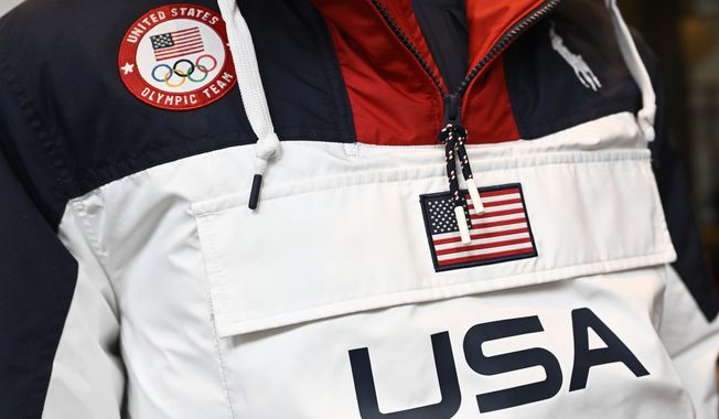 A Team USA Beijing winter Olympics opening ceremony uniform designed by Ralph Lauren is displayed Wednesday, Jan. 19, 2022, in New York. (Photo by Evan Agostini/Invision/AP)