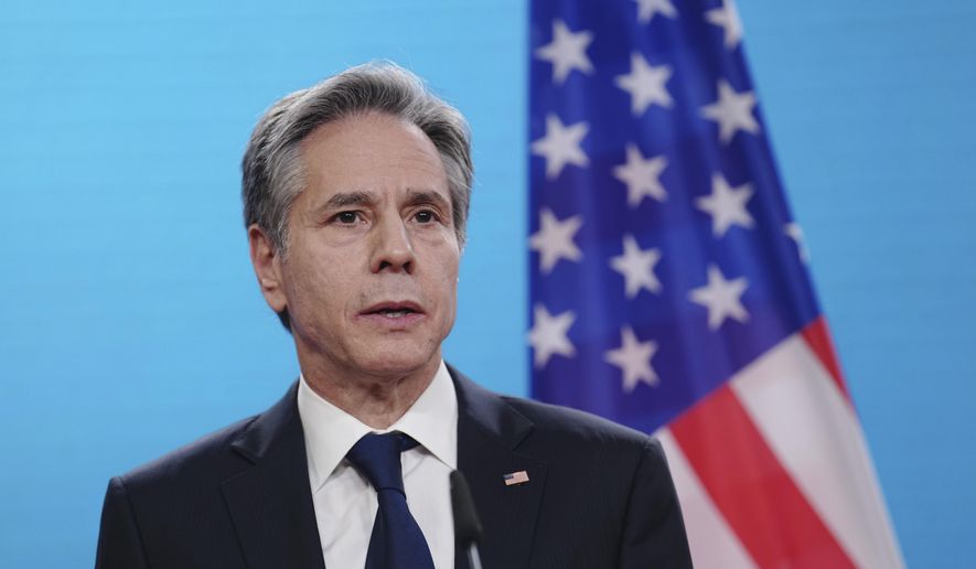 US Secretary of State Antony Blinken speaks to the media after talks with the foreign ministers of Great Britain, Germany and France at the Federal Foreign Office in Berlin, Germany, Thursday, Jan.20, 2022. (Kay Nietfeld/Pool via AP)