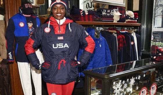 Bobsledder Aja Evans models the Team USA Beijing winter Olympics opening ceremony uniforms designed by Ralph Lauren on Wednesday, Jan. 19, 2022, in New York. (Photo by Evan Agostini/Invision/AP)