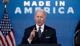 President Joe Biden speaks about Intel&#39;s announcement to invest in an Ohio chip making facility, at the South Court Auditorium in the Eisenhower Executive Office Building on the White House Campus in Washington, Friday, Jan. 21, 2022. (AP Photo/Andrew Harnik)