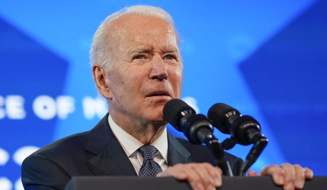 President Joe Biden speaks at the U.S. Conference of Mayors&#x27; 90th Annual Winter Meeting at the Capitol Hilton in Washington, Friday, Jan. 21, 2022. (AP Photo/Andrew Harnik)