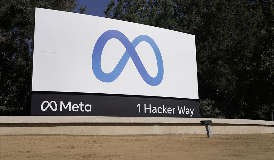 Facebook&#x27;s Meta logo sign is seen at the company headquarters in Menlo Park, Calif., on, Oct. 28, 2021.  The Biden administration is defending legal liability protections for tech platforms against a court challenge from former President Trump in his lawsuit against Facebook. (AP Photo/Tony Avelar, File) **FILE**