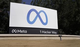 Facebook&#39;s Meta logo sign is seen at the company headquarters in Menlo Park, Calif., on, Oct. 28, 2021.  The Biden administration is defending legal liability protections for tech platforms against a court challenge from former President Trump in his lawsuit against Facebook. (AP Photo/Tony Avelar, File) **FILE**