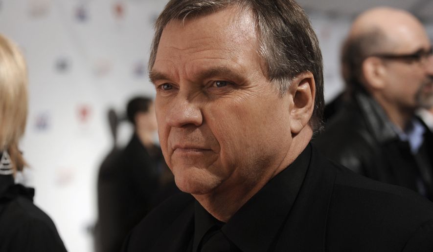 Singer Michael Lee Aday, who goes by the stage name Meat Loaf, arrives at the MusiCares Person of the Year tribute honoring Neil Diamond on Friday, Feb. 6, 2009, in Los Angeles. Meat Loaf, whose &quot;Bat Out Of Hell&quot; album is one of the all time bestsellers, has died, family said on Facebook, Friday, Jan. 21, 2022. (AP Photo/Chris Pizzello, File)