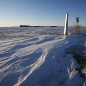 A border marker, between the United States and Canada, is shown just outside of Emerson, Manitoba, on Thursday, Jan. 20, 2022.  (John Woods/The Canadian Press via AP)