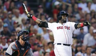 Boston Red Sox designated hitter David Ortiz, right, and Detroit Tigers catcher Jarrod Saltalamacchia watch the flight of Ortiz&#39;s three-run home run during the third inning of a baseball game July 26, 2016, at Fenway Park in Boston. Ortiz is on track for induction in Cooperstown this summer, riding the strength of his on- and off-field achievements to overcome stigmas that have stalled or derailed the candidacies of some of his predecessors. (AP Photo/Charles Krupa, File) **FILE**