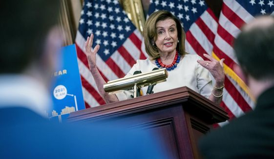 Speaker of the House Nancy Pelosi of Calif., speaks during her weekly press conference, Thursday, Jan. 20, 2022 at the Capitol in Washington. (Shawn Thew/Pool via AP)