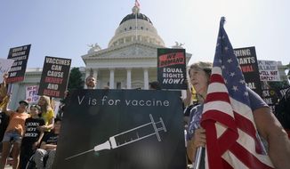Protesters opposing vaccine mandates gather at the Capitol in Sacramento, Calif., Wednesday, Sept. 8, 2021. State Sen. Scott Wiener, D-San Francisco, is introducing, Friday, Jan. 21, 2022, a bill that would allow children age 12 and up to be vaccinated without their parents&#x27; consent. (AP Photo/Rich Pedroncelli, File)