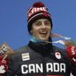 FILE - Men&#39;s slopestyle bronze medalist Mark McMorris, of Canada, smiles during the medals ceremony at the 2018 Winter Olympics in Pyeongchang, South Korea, Sunday, Feb. 11, 2018. McMorris has endured quite a pounding over more than a decade of hard riding that has made him Canada&#39;s most-decorated snowboarder. At 28 and heading into his third Olympics, he is missing one thing from an already awe-inspiring resume. (AP Photo/Morry Gash, File)
