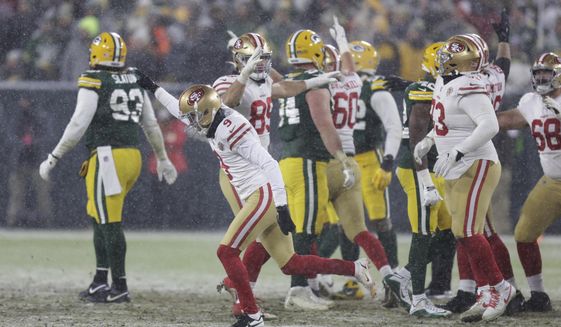 San Francisco 49ers&#39; Robbie Gould reacts after making the game-winning fieldgoal during the second half of an NFC divisional playoff NFL football game against the Green Bay Packers Saturday, Jan. 22, 2022, in Green Bay, Wis. The 49ers won 13-10 to advance to the NFC Chasmpionship game. (AP Photo/Matt Ludtke)