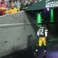 Green Bay Packers&#39; Aaron Rodgers leaves the field after an NFC divisional playoff NFL football game against the San Francisco 49ers Saturday, Jan. 22, 2022, in Green Bay, Wis. The 49ers won 13-10 to advance to the NFC Chasmpionship game. (AP Photo/Morry Gash)