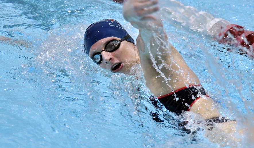 Transgender swimmer Lia Thomas, right during a meet with Harvard on Saturday, Jan. 22, 2022, at at Harvard University in Cambridge, Mass. Thomas won the two individual events in which she competed. (AP Photo/Josh Reynolds)