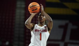 Maryland guard Diamond Miller shoots a basket against Northwestern during the second half of an NCAA college basketball game, Sunday, Jan. 23, 2022, in College Park, Md. Maryland won 87-59. (AP Photo/Julio Cortez) **FILE**